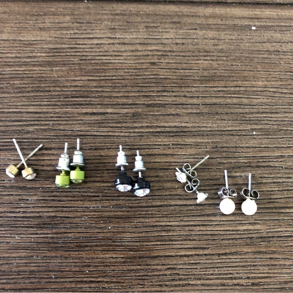 Multiple sets of stud earrings